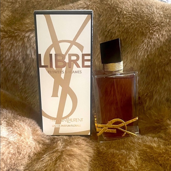 Yves Saint Laurent Elegant Gold and Black Fragrance - Picture 1 of 6